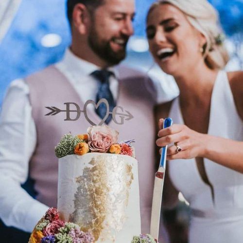 Bride & Groom cutting wedding cake